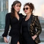 British actress Helena Bonham Carter standing alongside her daughter Nell Burton at a public event.