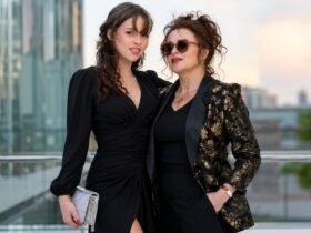 British actress Helena Bonham Carter standing alongside her daughter Nell Burton at a public event.