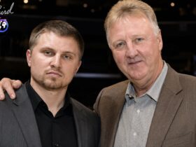 NBA legend Larry Bird standing alongside his adopted son, Connor Bird.