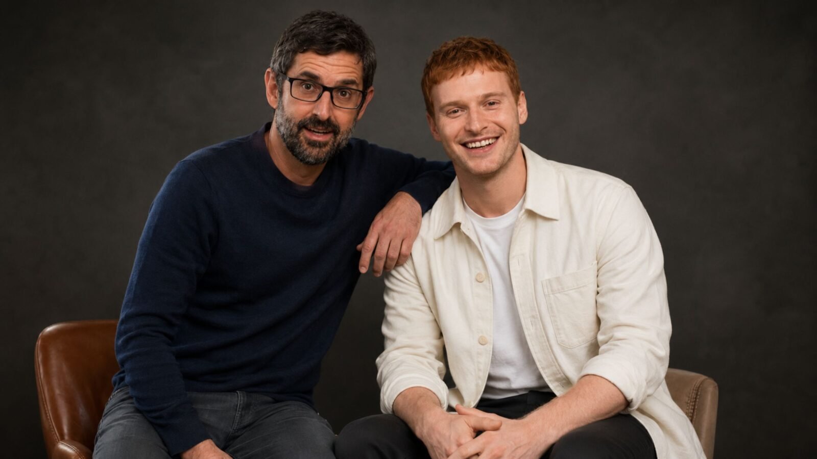 Documentary filmmaker Louis Theroux sitting next to Frederick Theroux .