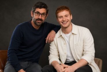 Documentary filmmaker Louis Theroux sitting next to Frederick Theroux .