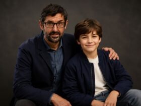 An AI-generated representation of documentary filmmaker Louis Theroux sitting with a Walter Theroux.