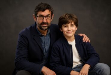 An AI-generated representation of documentary filmmaker Louis Theroux sitting with a Walter Theroux.