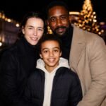 Actors Olivia Williams and Rhashan Stone posing for a photograph with Daughter Esmé Ruby Stone.