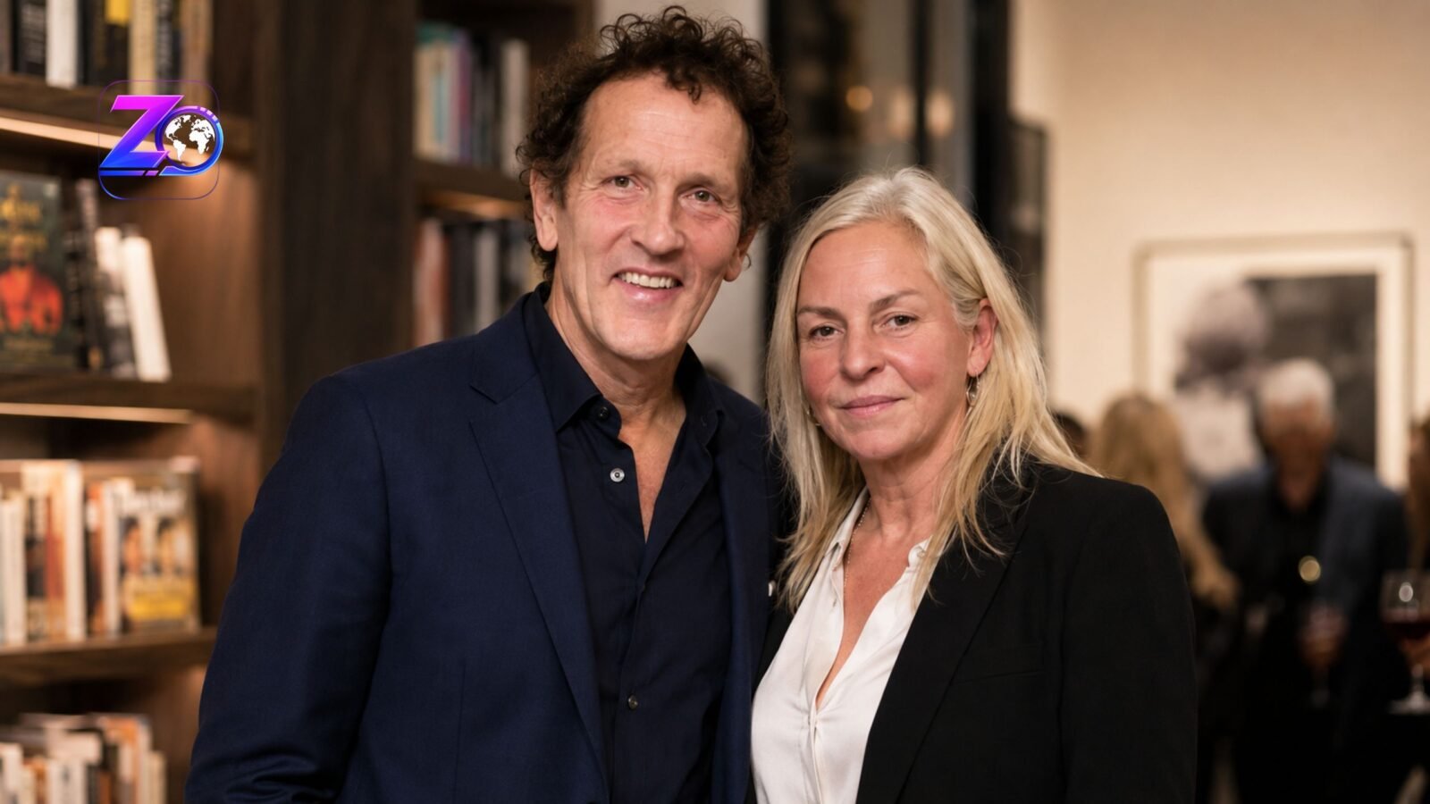 Monty Don and his wife Sarah Don standing together and smiling at an event.