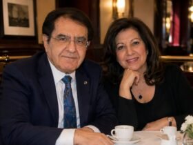 Dr. Younan Nowzaradan and his former wife Delores Nowzaradan sitting together at a restaurant table.